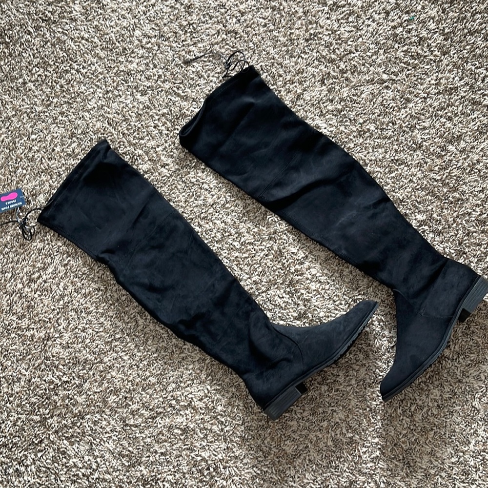 Over the knee flat boots
